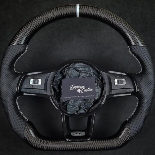 VW Golf mk7 with sport shape frame, perforated leather sides, Gloss twill 2x2 Carbon and white stitching and 12 o clock marker