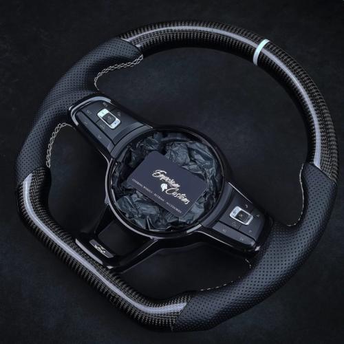 VW Golf mk7 with sport shape frame, perforated leather sides, Gloss twill 2x2 Carbon and white stitching and 12 o clock marker