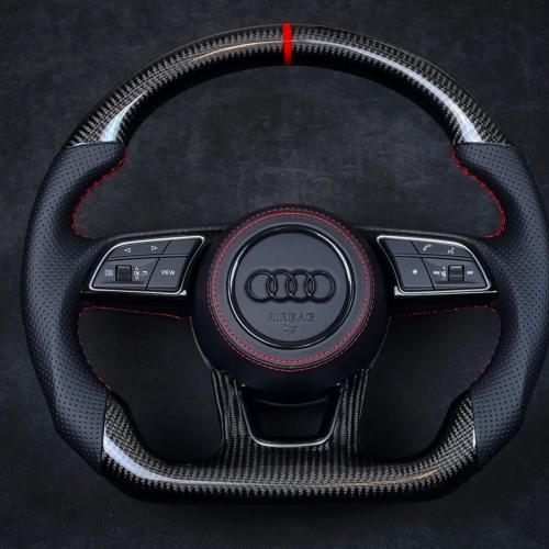 Beautiful Audi wheel in black perforated leather, Gloss twill 2x2 Carbon with red top marker and stitching and matching leather airbag cover