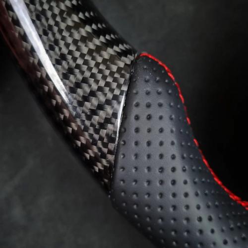 Gloss twill 2x2 Carbon and perforated leather with red stitching